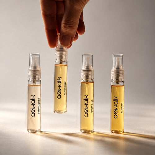 Discovery Set vials with a hand reaching for one
